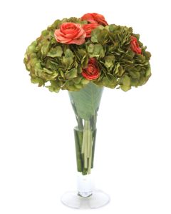 Green Hydrangeas and Coral Ranunculus in Trumpet Vase