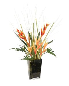 Mixed Tropical Flowers and Foliage in Leopard Vase
