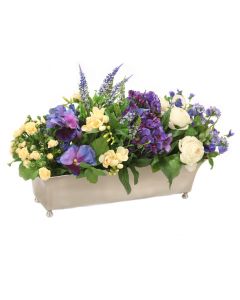Mixed Garden of Flowers with Pansies, Hydrangeas and Roses in Silver Planter