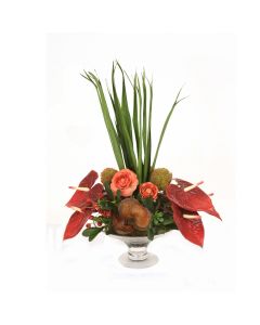 Anthuriums Mixed with Rose Hip, Ranunculus and Mixed Greens in Glass Compote