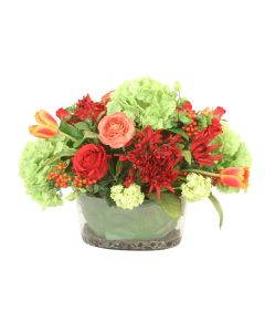 Red, Green, Orange Mixed Garden Flowers in Oval Glass