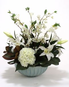 White Hydrangea, Casablanca Lily, and Cherry Blossoms in A Pool Blue Fluted Bowl